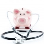 shutterstock_76787638 piggy bank with stethoscope