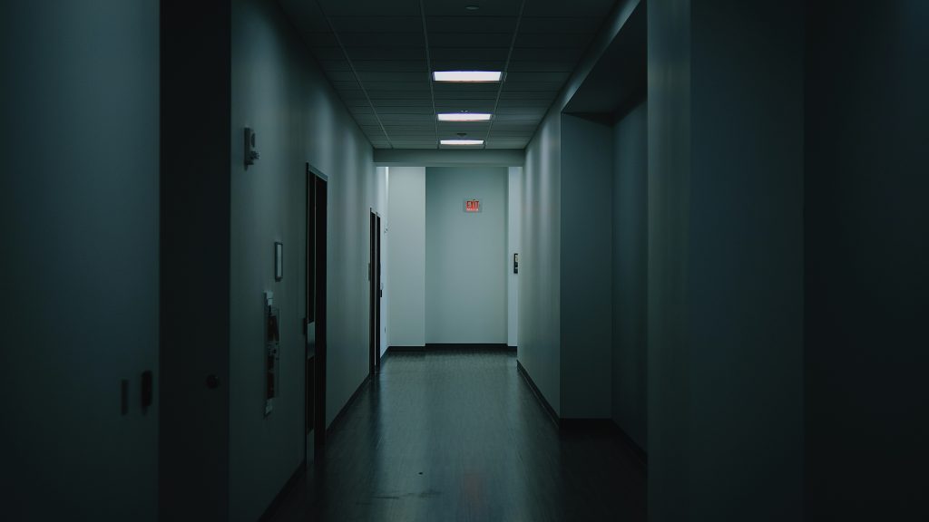 View down a corridor in what may be a clinical setting.