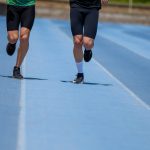 Close-up,Detail,Shot,Of,The,Legs,Of,Two,People,Running